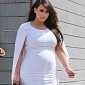 Pregnant Kim Kardashian Is “Tortured” by Kanye West’s High Fashion Demands - Video