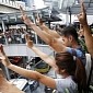 Protesters in Thailand Adopt “Hunger Games” Salute as Their Sign