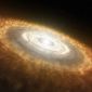 Protoplanetary Disks Found Orbiting Close to Their Stars