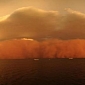 Red Dust Storm Hits Australia, Cyclone Expected to Follow