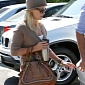 Reese Witherspoon in Trouble with PETA for Illegal Python Bag
