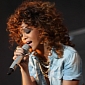 Rihanna Shows Off Chin Scar, Hints at Plastic Surgery