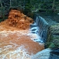 River Holme in West Yorkshire Runs Orange
