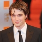 Robert Pattinson Admits to Dating Kristen Stewart