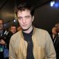 Robert Pattinson Adopts a Puppy Because He’s Too Lonely