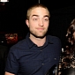 Robert Pattinson Emerges from Hiding to Party