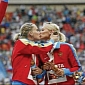 Russian Female Track Champs Kiss in Protest of Anti-Gay Laws