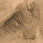 Sand Flows May Have Created Martian Gullies