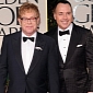 Sir Elton John's Husband Apologizes for Madonna Comments