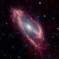 Spitzer Finds Hidden Dwarf Galaxy Around Milky Way