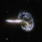 Star Formation Conditions in Collision Debris Identical to Those Inside Galaxies
