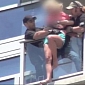 Stuntmen Rescue Suicidal Woman Threatening to Jump off Balcony – Video