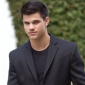 Taylor Lautner Hits the Gym to Pack More Muscle