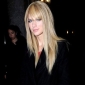 Taylor Swift Unveils New ‘Do: Straight Hair and Bangs