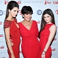 The Jenners, Kylie and Kendall, Stun in Red on Runway