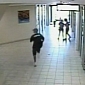 Thief Smashes Through Glass Door in Shopping Center – Video