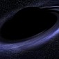 Trio of Supermassive Black Holes Found at the Core of Distant Galaxy