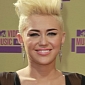 VMAs 2012: Miley Cyrus Busts Out of Her Dress