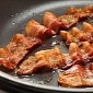 Viral Video Shows Man Using an Assault Rifle to Cook Bacon