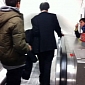 Viral of the Day: Drunk Businessman Walks Down Subway Escalator