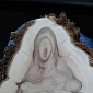 Virgin Mary and Baby Jesus Reveal Themselves on Tree Log