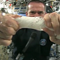 Watch: Chris Hadfield Wrings Out a Wet Washcloth in Space