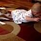 Watch: Dog Tries to Teach Baby How to Crawl