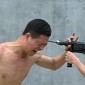 Watch: Kung Fu Master Takes Drill to the Head, Survives