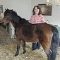 Woman Lets Pony Move into Her Front Room