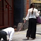 Woman Walks Man Like a Dog Through Central London