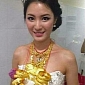 Woman Wears Wedding Dress Adorned with $320,000 (€250,000) Worth of Solid Gold Jewelry