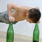 World's Strongest Boy Does Push-Ups on Glass Bottles