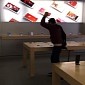 Angry Apple Customer Goes Bananas in Store, Destroys iPhones with Steel Ball - Videos