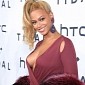 Beyonce Leaves Little to the Imagination in Maroon Dress at TidalX Concert - Video