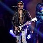 Lenny Kravitz Threatens Lawsuit over Leather Pants Photos, Claims Violation of Human Rights