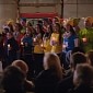 Watch Microsoft’s Employees Singing “Let There Be Peace on Earth” in Front of Apple Store