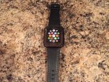 Fake Apple Watch with what appears to be a sticker instead of a display and a poorly-built band