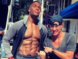 Michael Strahan shows off his impressive muscle definition on the set of "Magic Mike 2"