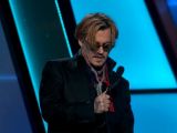 “This is the weirdest microphone I have seen in my life,” Johnny Depp proclaims at the HFAs 2014