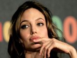 Jolie says Brad supported her as a director, they pulled through together