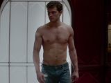 He may have a smooth face, but at least Christian Grey is ripped