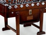 The 50s era foosball table, with rubber playing surface