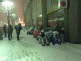 People camping out in the cold waiting for the doors to their local store to open
