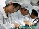 Workers at Apple factory in China