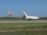 Atlantis deploying its rear chute as it lands on Runway 33 at the KSC