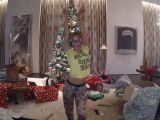 In the mood for Christmas already: Beyonce pops out of a box, dances in front of a tree in “7/11” video
