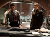 Howard Stark (Dominic Cooper) helps Steve Rogers come up with the Captain America costume
