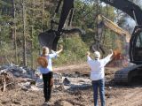 Daryl Hannah tries to keep bulldozers from doing their job