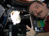 Chris Hadfield and the Dragon after he successfully captured the spacecraft with the robot arm