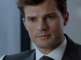 Jamie Dornan plays the charismatic, dangerous, and mysterious Christian Grey